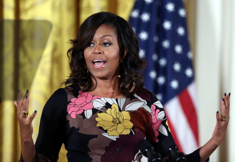 The mayor of Clay, West. Va., a town of roughly 500 people, has resigned after an exchange on a Facebook post in which a county official compared First Lady Michelle Obama to an 