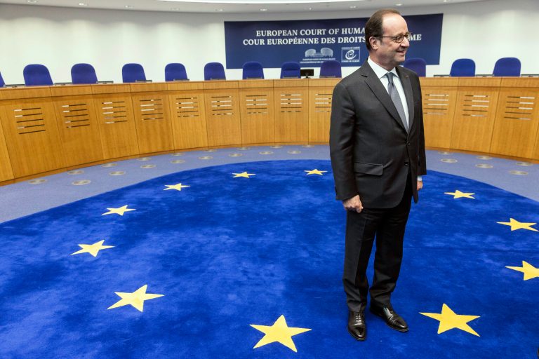 French President Francois Hollande waits at the European Human Rights Court, in Strasbourg, eastern France, Tuesday, Oct. 11, 2016. Hollande also spoke at the Council of Europe. (AP Photo/Jean-Francois Badias)