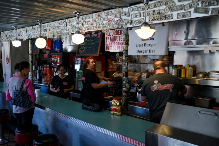 Workers at the Burger Bar in Bristol, Virginia, cook food for takeout on May 2.