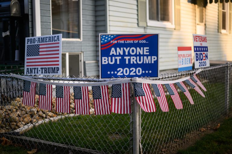 Anti-Trump signs line the fence of a Republican voter who is now supporting Joe Biden at his home on Monday, Sept. 21, 2020 in Verona, Pa. The homeowner, a veteran of the Vietnam War, says he feels Trump isnât truly a conservative. 