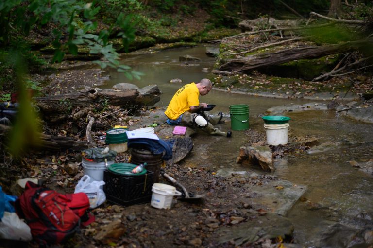 Judd Stauber, 47, of Allison Park, Pa., prospects for gold along a section of McKee Run that flows through private property in Wampum, Pa.