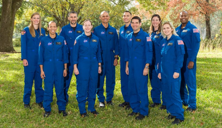 The 10 candidates, pictured here at NASAâs Johnson Space Center in Houston are U.S. Air Force Maj. Nichole Ayers, Christopher Williams, U.S. Marine Corps Maj. (retired) Luke Delaney, U.S. Navy Lt. Cmdr. Jessica Wittner, U.S. Air Force Lt. Col. Anil Menon, U.S. Air Force Maj. Marcos Berrios, U.S. Navy Cmdr. Jack Hathaway, Christina Birch, U.S. Navy Lt. Deniz Burnham, and Andre Douglas.