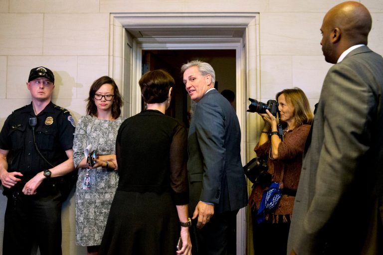 House Majority Leader Kevin McCarthy of Calif., center, turns to his wife Judy McCarthy as they enter a House Republican caucus vote on its nominee to replace House Speaker John Boehner, Thursday, Oct. 8, 2015, on Capitol Hill in Washington. (AP Photo/Jacquelyn Martin)