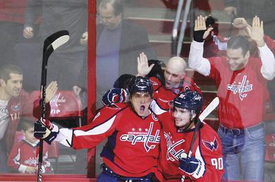 Capitals leap ahead in division