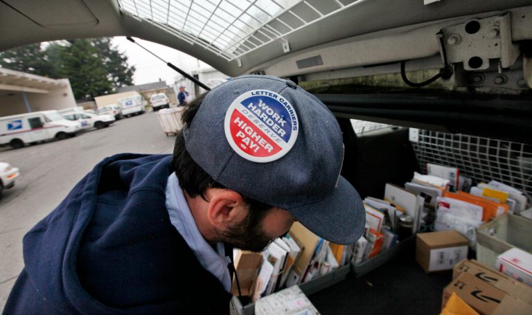 The post office lost money for the ninth year, due to competition, lack of flexibility and benefits costs.Â (AP Photo/Elaine Thompson)