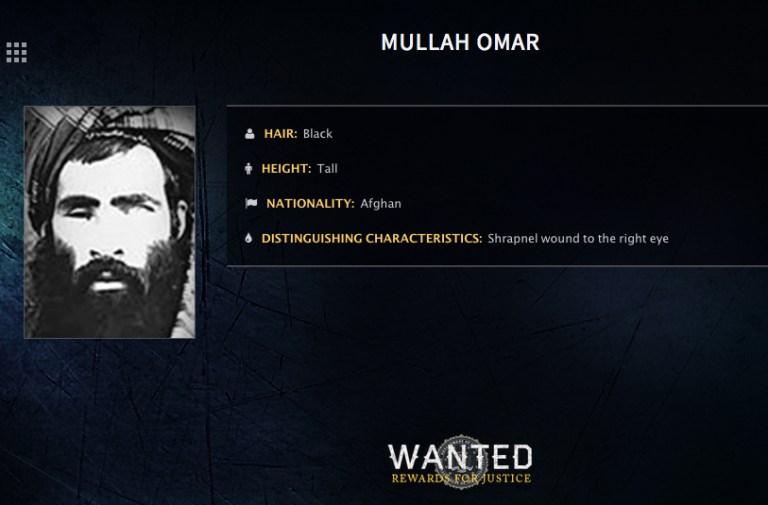 Mullah Omar is seen in a wanted poster. An Afghan official says his government is examining claims that reclusive Taliban leader Mullah Omar is dead. (FBI via AP, File)