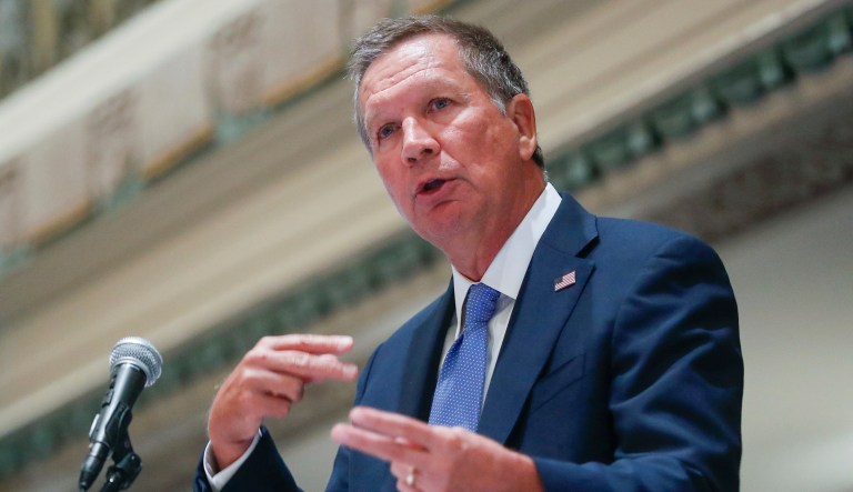 They're worried about the effects the law will have on their states. (AP Photo/John Minchillo)