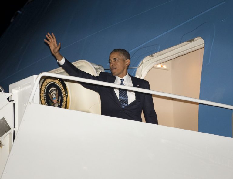   President Barack Obama waves as he boards Air Force One before his departure, Tuesday, Sept. 3, 2013 at Andrews Air Force Base, Md. Obama is traveling to Sweden and later to the G-20 Summit in St. Peterburg, Russia. (AP Photo/Pablo Martinez Monsivais)  