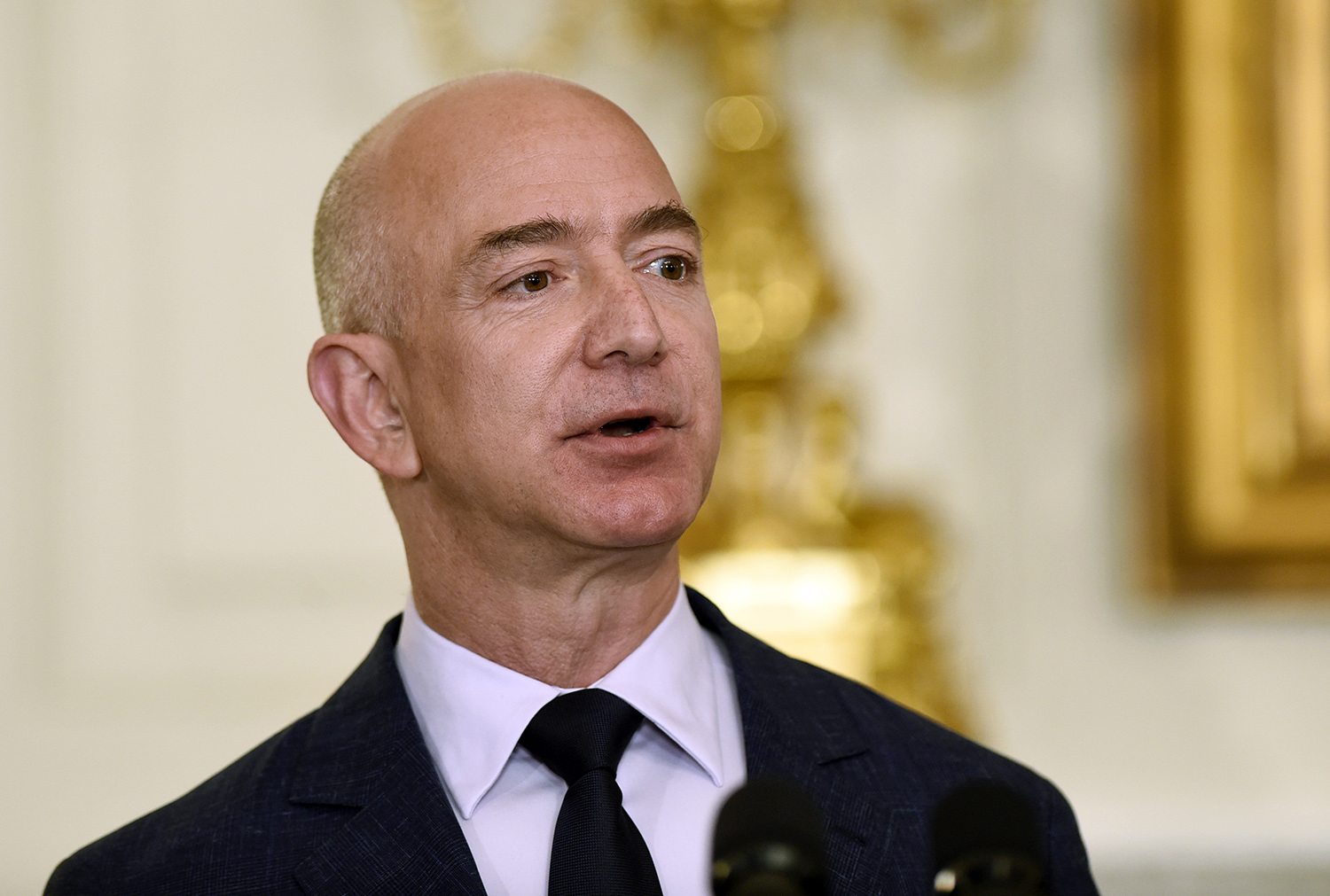 Bezos avoids Trump talk in Washington