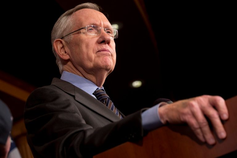 Senate Majority Leader Harry Reid of Nev. pauses during a news conference on Capitol Hill in Washington, Thursday, Nov. 21, 2013, after the Democrat majority in the Senate pushed through a major rules change, one that curbs the power of the Republican minority to block President Obama's nominations for high-level judgeships and cabinet and agency officials. (AP Photo/Jacquelyn Martin)