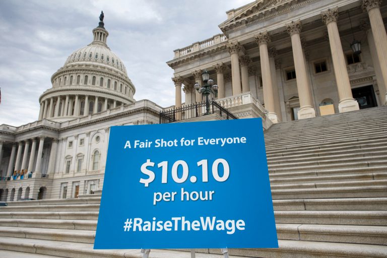 A chart prepared by Senate Democrats rests on an easel on the Senate steps before a news conference urging approval for raising the minimum wage at the Capitol in Washington on Wednesday. (AP Photo/J. Scott Applewhite)