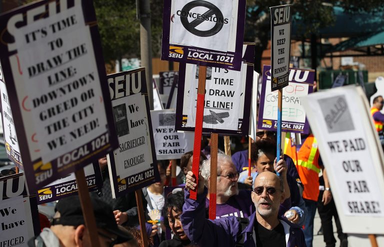 Member of the SEIU Local 1021 protest outside of San Francisco General Hospital on March 21, 2012 in San Francisco, California. (Photo by Justin Sullivan/Getty Images)