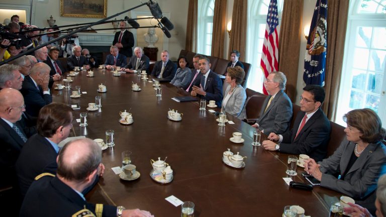 President Barack Obama speaks to media in the Cabinet Room of the White House in Washington, Tuesday, Sept. 3, 2013, before a meeting with Congressional leaders to discuss the situation in Syria. Rear center, from left are, Senate Foreign Relations Committee Chairman Sen. Robert Menendez, D-N.J, House Minority Whip Steny Hoyer of Md., Senate Majority Whip Richard Durbin of Ill., National Security Adviser Susan Rice,  House Speaker John Boehner of Ohio, the president, House Minority Leader Nancy Pelosi of Calif., Senate Minority Leader Mitch McConnell of Ky., House Majority Leader Eric Cantor of Va. and Senate Intelligence Committee Chair Sen. Dianne Feinstein, D-Calif. Rear, center, from right to left are, Sen. Bob Corker, R-Tenn., ranking Republican on the Senate Foreign Relations Committee, Rep. Dutch Ruppersberger, ranking Democrat on the House Intelligence Committee, and Senate Minority Whip John Cornyn of Texas. (AP/Carolyn Kaster)