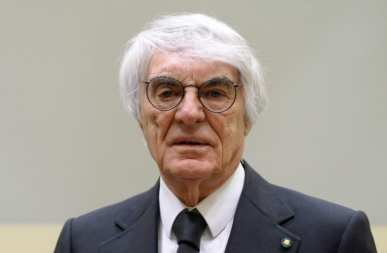 Formula One boss Bernie Ecclestone arrives for the second day of his trial at court in Munich, southern Germany, Friday, May 2, 2014. Ecclestone is charged with bribery and incitement to breach of trust 