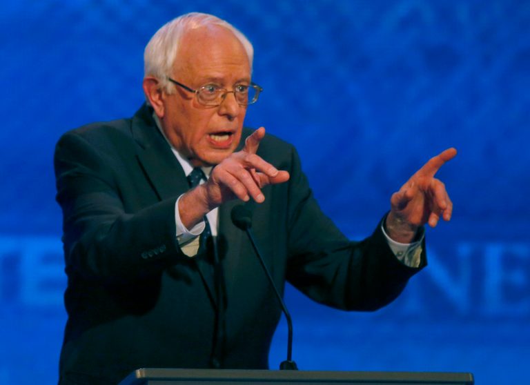 Bernie Sanders speaks says he'd get rid of all the bankers at the Federal Reserve if he wins the White House. (AP Photo/Jim Cole)