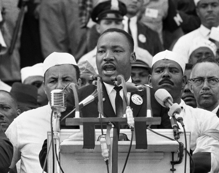 Dr. Martin Luther King Jr. addresses marchers during his 