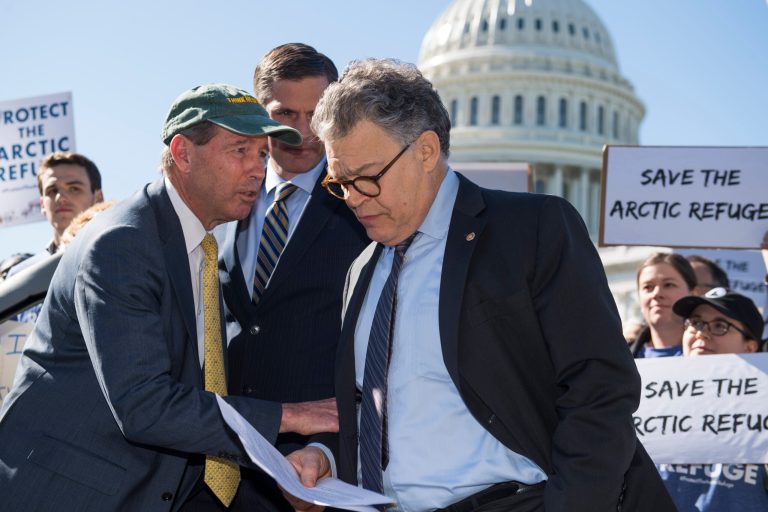 From left, Sens. Tom Udall, D-N.M., Martin Heinrich, D-N.M., and Al Franken, D-Minn., attend a news conference with Democratic senators and environmental groups on the east lawn of the Capitol to oppose oil and gas drilling in the Arctic National Wildlife Refuge on October 17. (CQ Roll Call via AP Images)
