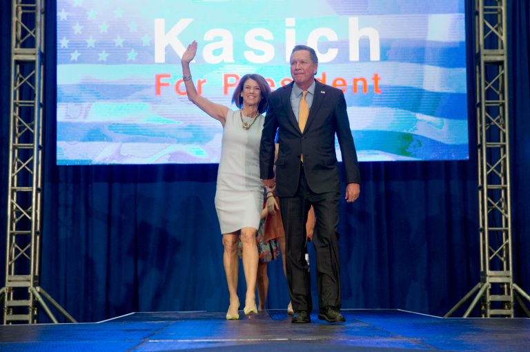 Republican presidential candidate Ohio Gov. John Kasich and his wife Karen walk out to speak at his presidential primary election night rally in Berea, Ohio, on Tuesday, March 15, 2016. (AP Photo/Matt Rourke)