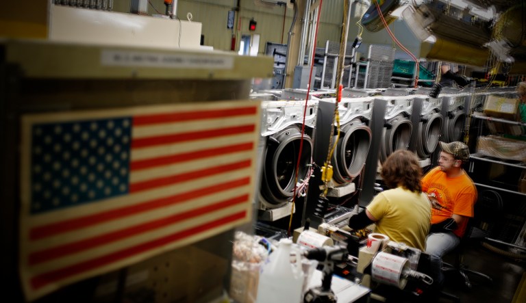 Workers assemble washing machines at the Whirlpool Corp. manufacturing facility in Clyde, Ohio.