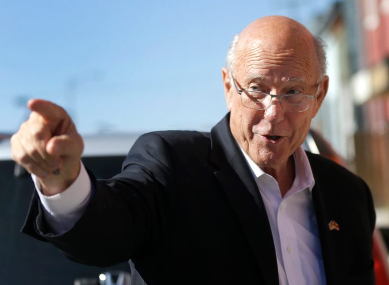 In this Oct. 30, 2014 file photo, Sen. Pat Roberts, R-Kan., points to supporters during a campaign stop in Leavenworth. (AP Photo/Orlin Wagner, File)
