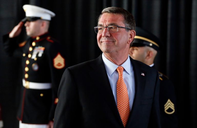 The Navy, Carter told the newly minted officers, will play a vital role in checking Chinese ambitions. (AP Photo/Brennan Linsley)