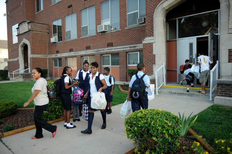 Students enter Our Lady of Hungary catholic school in South Bend, Ind., for the first day of school August 17, 2011. (AP File)