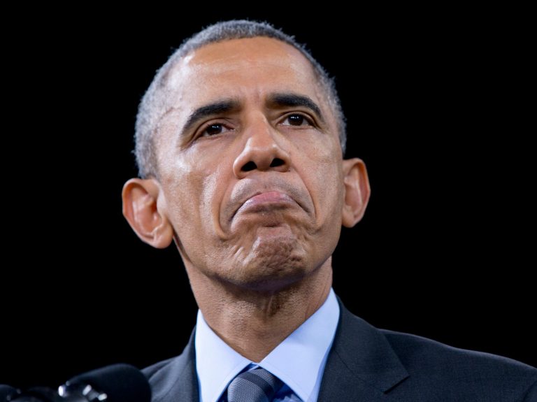 President Barack Obama pauses while speaking about immigration, Friday, Nov. 21, 2014, at Del Sol High School in Las Vegas. The president unveiled expansive executive actions on immigration Thursday night to spare nearly 5 million people in the U.S. illegally from deportation, setting off a fierce fight with Republicans over the limits of presidential powers. (AP Photo/Carolyn Kaster)