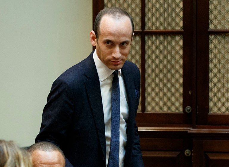 Stephen Miller said a new order is by no means an admission the initial travel ban was flawed. (AP Photo/Evan Vucci)