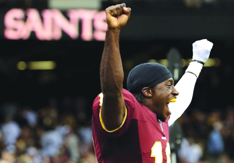 Ronald Martinez/Getty Images
Robert Griffin III completed 19 of 26 passes for 320 yards and two touchdowns as the Redskins upset the Saints on Sunday.