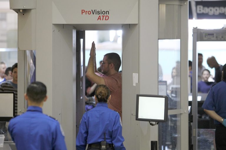 An air traveler stands in a full-body scanner at Los Angeles International Airport on February 20, 2014 in Los Angeles, California. (Photo by David McNew/Getty Images)