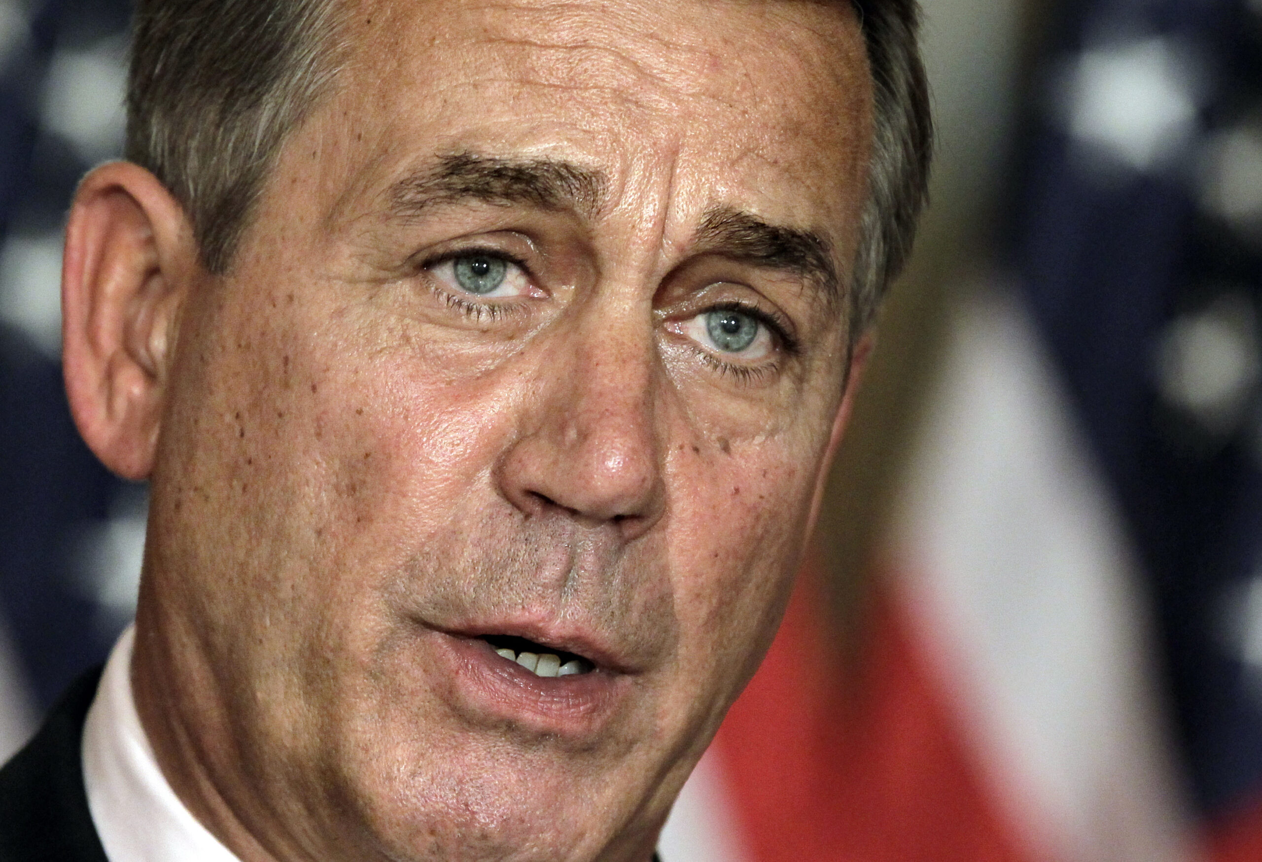 Obama backs off hard lines in search of compromise