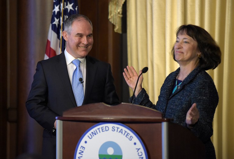 Environmental Protection Agency (EPA) Administrator Scott Pruitt smiles as his is introduced by former acting EPA Administrator Catherine McCabe, as Pruitt spoke to employees of the EPA in Washington, Tuesday, Feb. 21, 2017. (AP Photo/Susan Walsh)