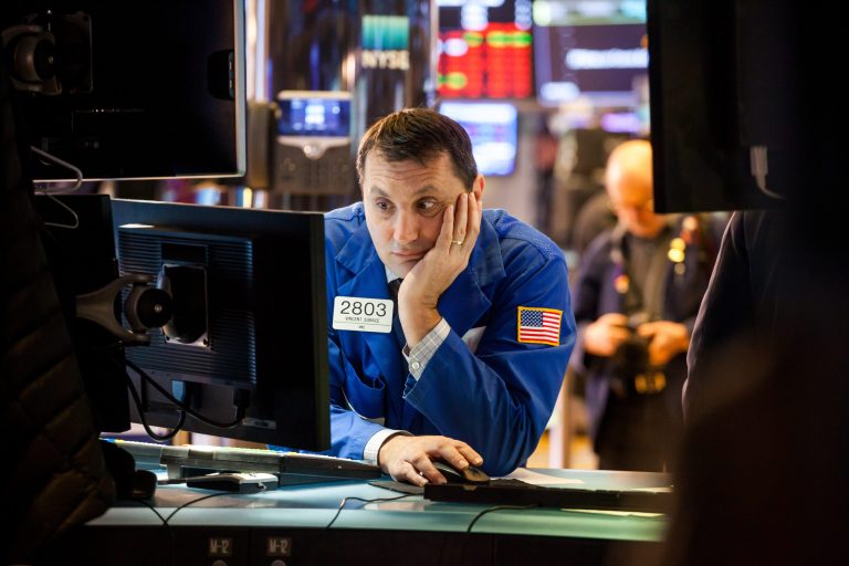 A trader works on the floor of the New York Stock Exchange. The blue-chip Dow Jones Industrial Average tumbled more than 1,000 points Thursday, the second such drop in a week.Photographer: Michael Nagle/Bloomberg
