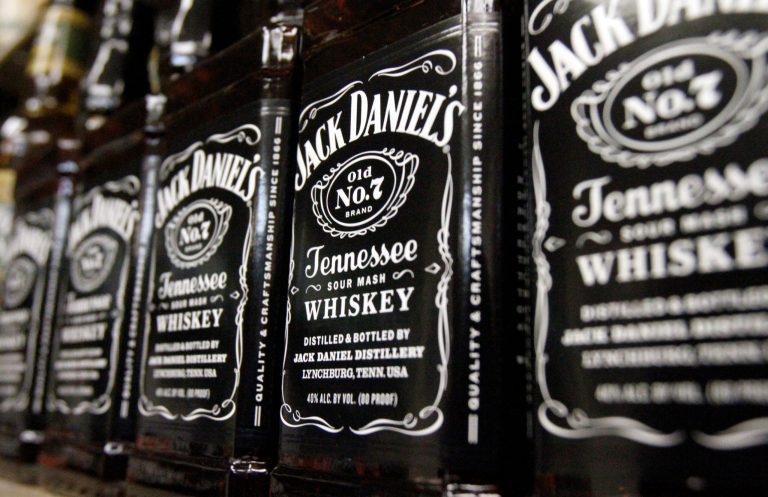 In this Dec. 5, 2011 file photo, bottles of Jack Daniel's Tennessee Whiskey line the shelves of a liquor outlet in Montpelier, Vt.