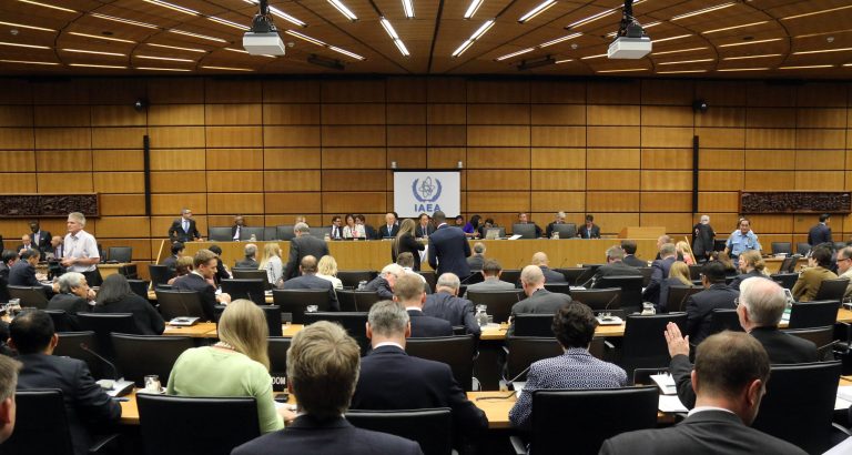Delegates wait for the start of the International Atomic Energy Agency (IAEA) board of governors meeting at the International Center, in Vienna,, Austria, Monday, June 2, 2014. (AP Photo/Ronald Zak)
