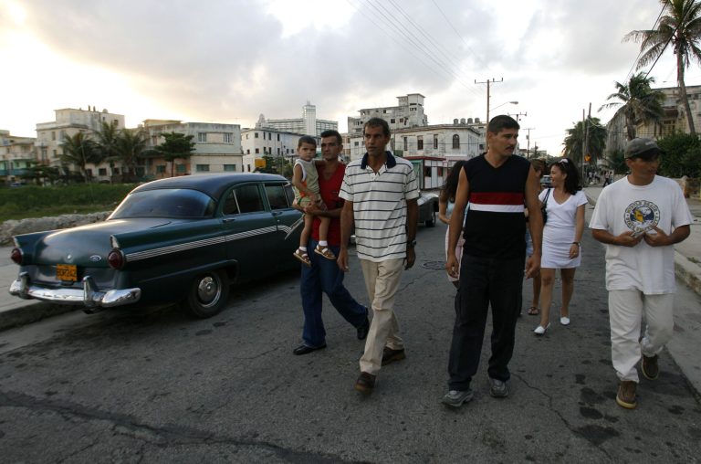 A group of Cubans after arriving on the Florida Keys in 2006.(AP Photo/ Javier Galeano)