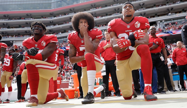 In his State of the Union address Tuesday night, President Trump took a subtle jab at NFL football players who have spent the past year protesting race relations by taking a knee during the national anthem at games. (AP Photo/Marcio Jose Sanchez, File)