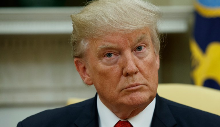 Twitter users say they're reporting President Trump's account to Twitter after his tweets about MSNBC host Mika Brzezinski. (AP Photo/Evan Vucci)