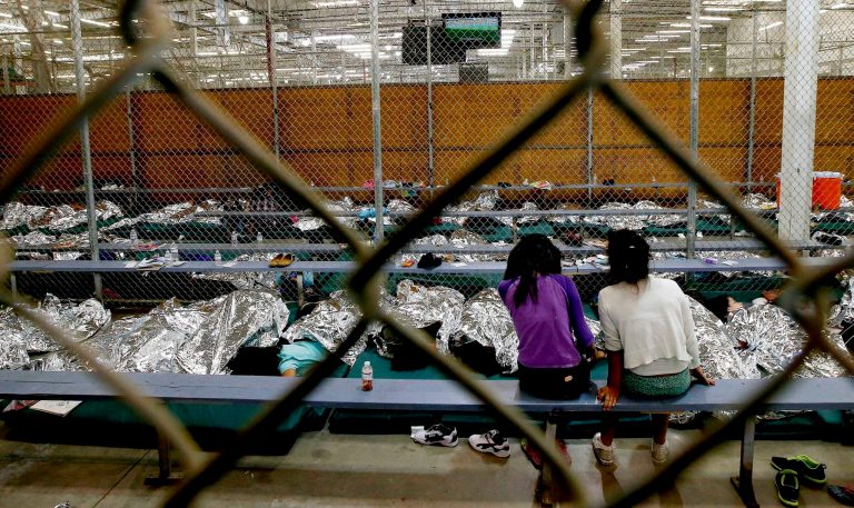 Stagnant wages and depressed economic growth affect working poor Americans of all colors, while illegal alien amnesty beneficiaries cash in. (AP Photo)