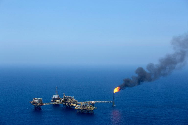 Gas is flared from a tower on an oil drilling rig operated by Petroleos Mexicans (Pemex) in the Ku-Maloob-Zaap oilfield at Campeche Bay off the coast of Ciudad del Carmen, Mexico, on Friday, Aug. 1, 2014.Â (Susana Gonzalez/Bloomberg)