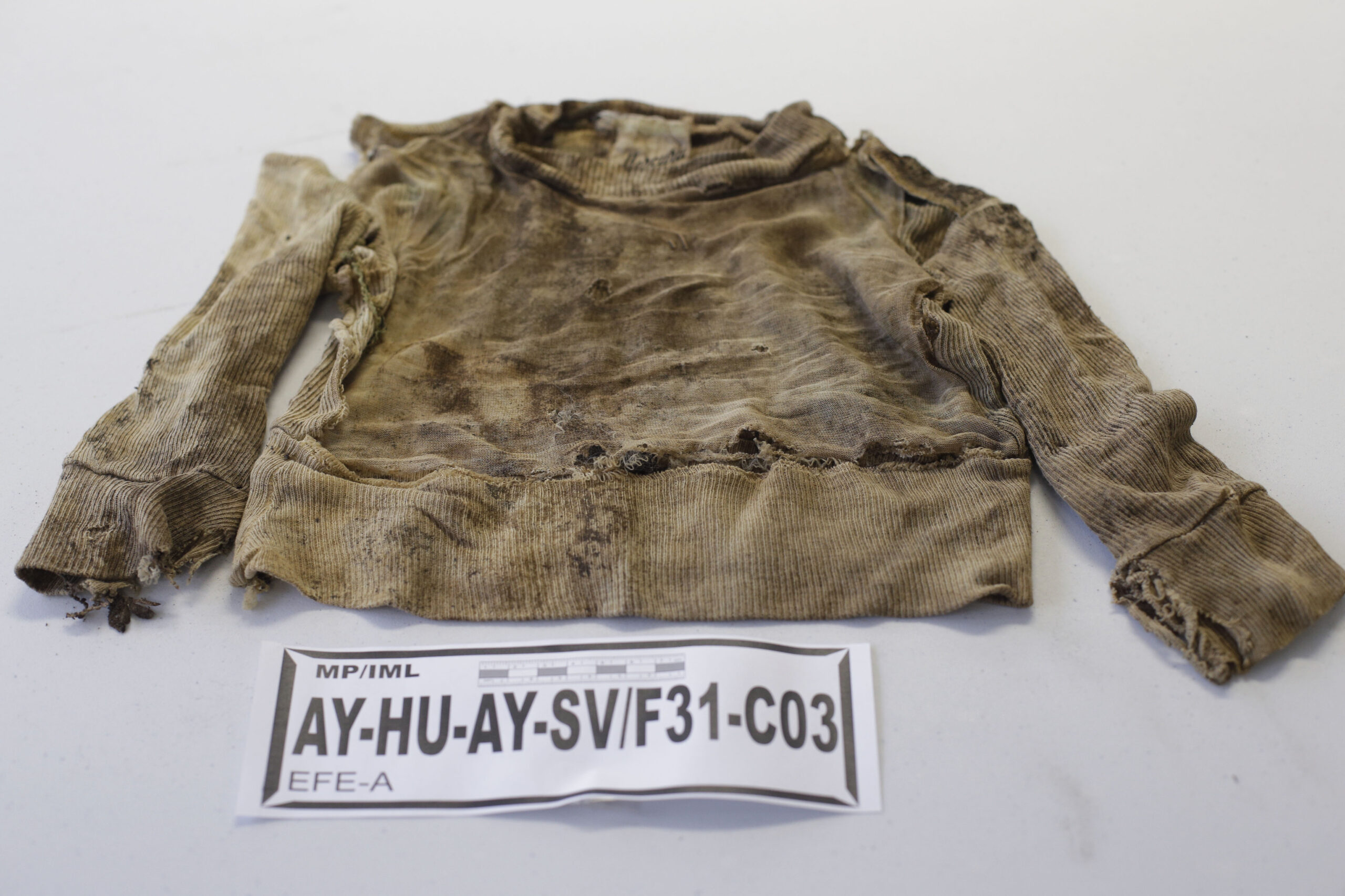 Clothing of 53 victims exhumed at Peru base shown