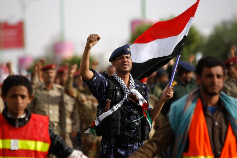 A Yemeni officer who is a member of Shiite Hawthi rebels chants slogans demanding the government step down during a demonstration on a street in Sanaa, Yemen, Sunday, Aug. 24, 2014. Yemen's Shiite rebel group called for new protests Sunday after rejecting a draft proposal by a presidential delegation to stop their demonstrations in return for a new government and a review of the country's economic policies. (AP Photo/Hani Mohammed)
