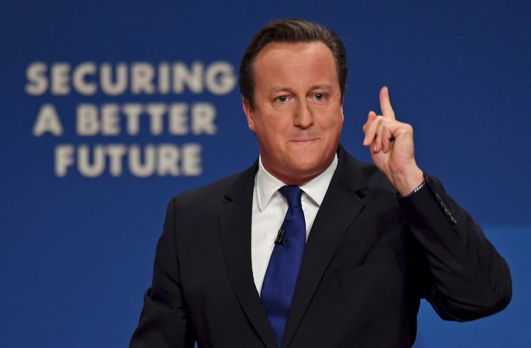 Britain's Prime Minister David Cameron delivers his keynote speech to delegates at the Conservative Party annual party conference in the International Convention Centre in Birmingham, England, Wednesday Oct. 1, 2014. During his speech Cameron revealed anticipated tax changes for the basic rate tax payers and for the people who pay the top rate of tax. (AP Photo / Joe Giddens, PA) UNITED KINGDOM OUT - NO SALES - NO ARCHIVES