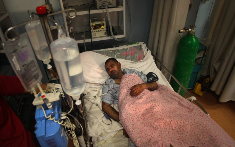 In this photo taken on Dec. 19, 2010, A wounded Afghan soldier recuperates at Dawood National Military Hospital in Kabul, Afghanistan. The top medical officer in the Afghan military has been removed after coming under investigation over deep neglect at the country's top hospital and the widespread disappearance of U.S.-donated medicines, which has left wounded and sick troops without adequate care, the Afghan defense minister says. (AP Photo/Altaf Qadri)