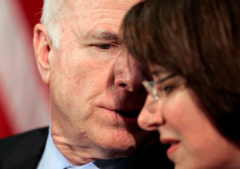 U.S. Sen. John McCain, left, talks with Democrat Sen, Amy Klobuchar during a news conference at the US Embassy in Tokyo back in 2009. McCain. The duo have teamed up to target foreign campaign ads. (AP Photo/Itsuo Inouye)