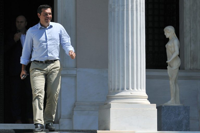 Greek Prime Minister Alexis Tsipras leaves his office in Athens, on Thursday, Aug. 20, 2015. (Giannis Kotsiaris/ InTime News via AP)Â 