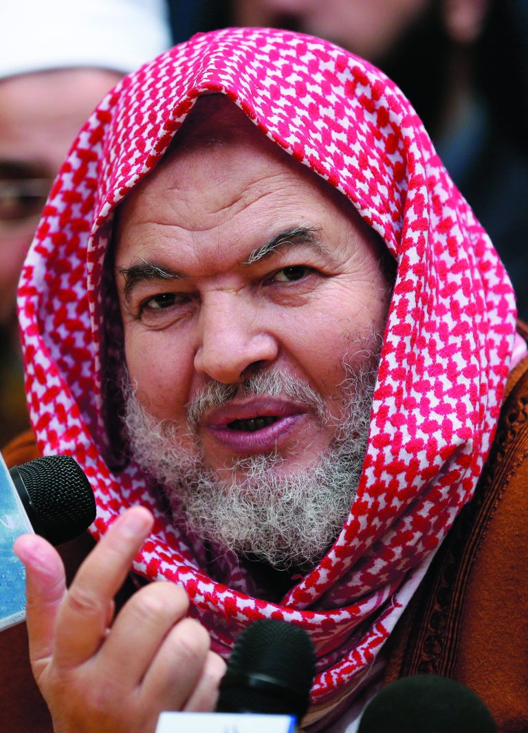 In this Sunday, Dec. 16, 2012 photo, Sheik Said Abdel-Azim a leader of al-Dawa al-Salafiya speaks during a press conference, in Alexandria, Egypt. A politicized religious sermon by a prominent ultraconservative cleric set off angry protests, where sword-wielding supporters of the 87-year old Sheik Ahmed el-Mahalawi clashed for hours with rock-throwing opponents. In an unimaginable twist, the cleric was locked up inside for over 12 hours during the battle, while opponents accused his supporters of detaining protesters and beating them inside the mosque. (AP Photo/Hassan Ammar)