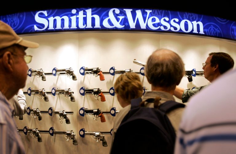 Smith & Wesson shares have spiked in the last two days of American trading, and guns flew off the shelves on Black Friday this year, following a brutal first ten months of U.S. mass shootings in 2015. (AP Photo/Jeff Roberson)