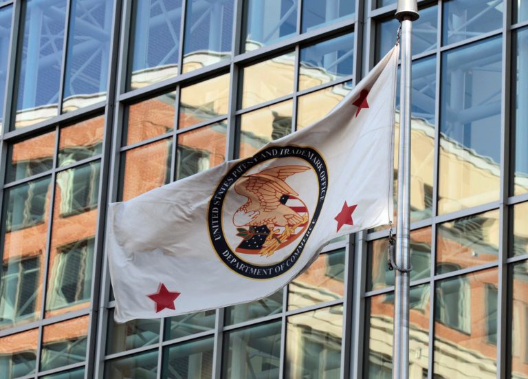 The flag for the U.S. Patent and Trademark Office is seen in Alexandria, Va., Friday, Feb. 25, 2011. (AP Photo/Alex Brandon)
