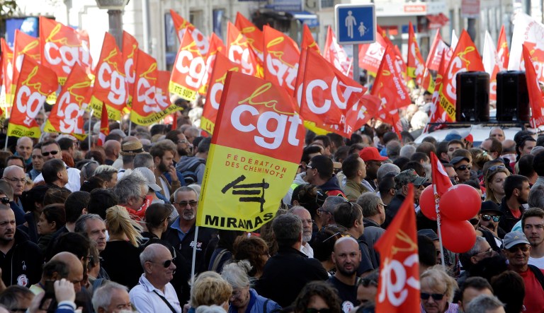 President Emmanuel Macron's presidency is facing its first big public test, as unions hold nationwide protests against changes to labor laws that they fear corrode hard-fought job security. (AP Photo/Claude Paris)